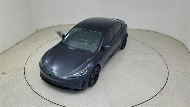 Photo of 2025 Black Tesla Model 3