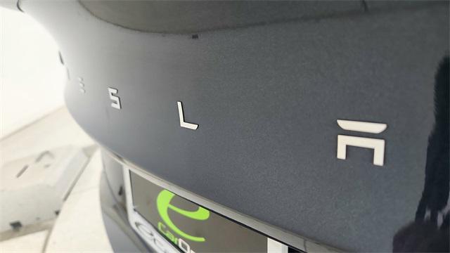 Photo of 2025 Black Tesla Model 3
