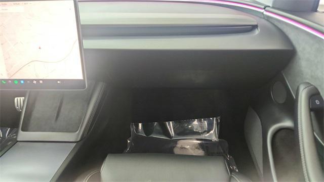 Photo of 2025 Black Tesla Model 3