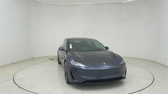 Photo of 2025 Black Tesla Model 3