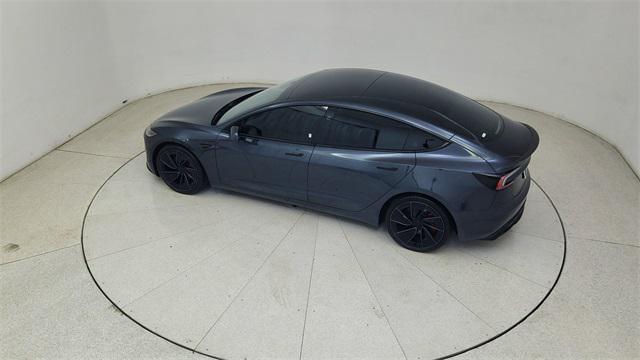 Photo of 2025 Black Tesla Model 3