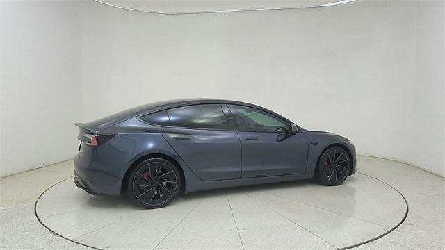 Photo of 2025 Black Tesla Model 3