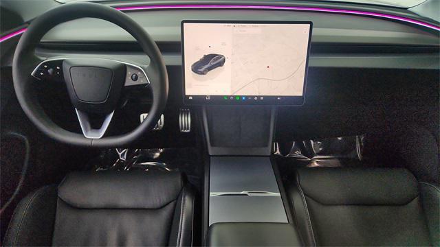 Photo of 2025 Black Tesla Model 3