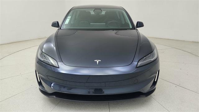 Photo of 2025 Black Tesla Model 3