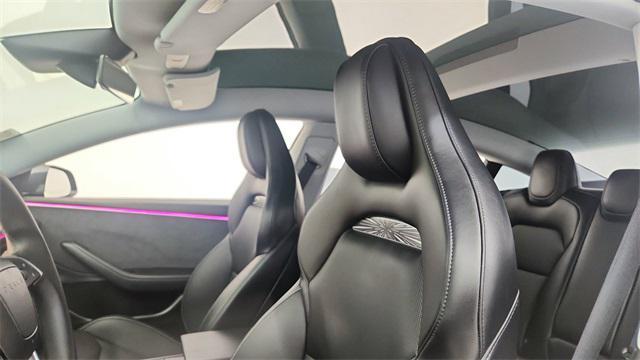 Photo of 2025 Black Tesla Model 3