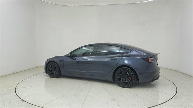 Photo of 2025 Black Tesla Model 3