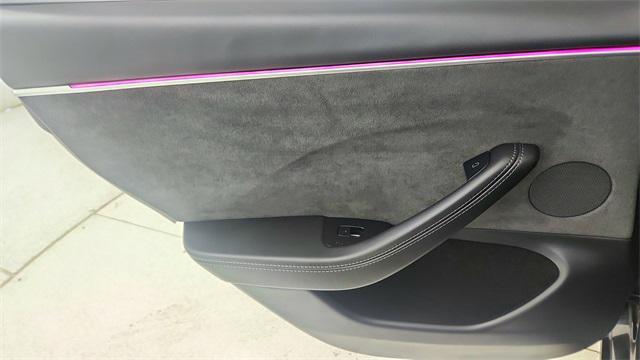 Photo of 2025 Black Tesla Model 3