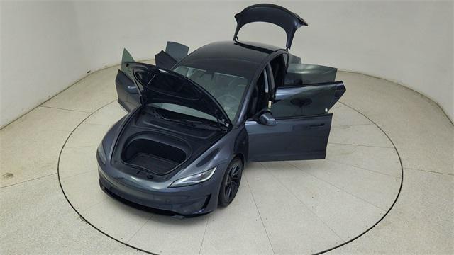 Photo of 2025 Black Tesla Model 3