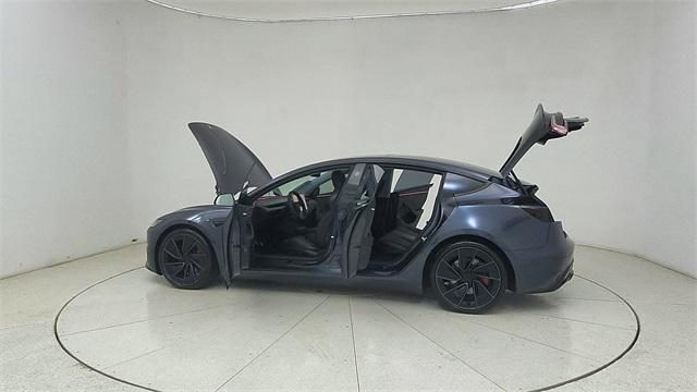 Photo of 2025 Black Tesla Model 3