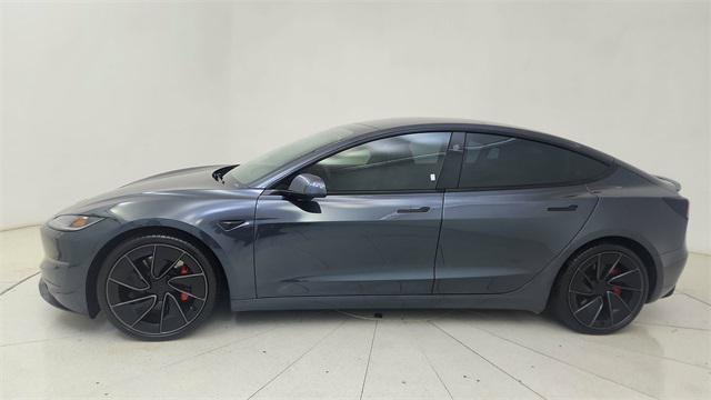 Photo of 2025 Black Tesla Model 3