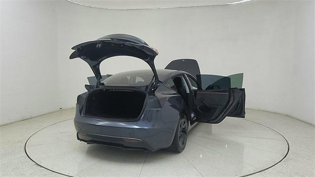 Photo of 2025 Black Tesla Model 3