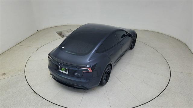 Photo of 2025 Black Tesla Model 3