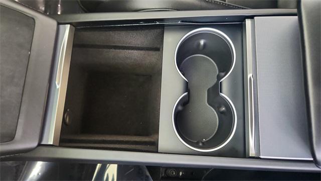 Photo of 2025 Black Tesla Model 3
