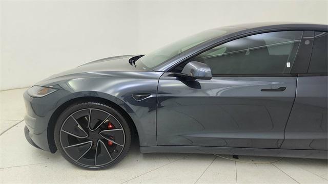 Photo of 2025 Black Tesla Model 3