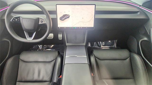 Photo of 2025 Black Tesla Model 3