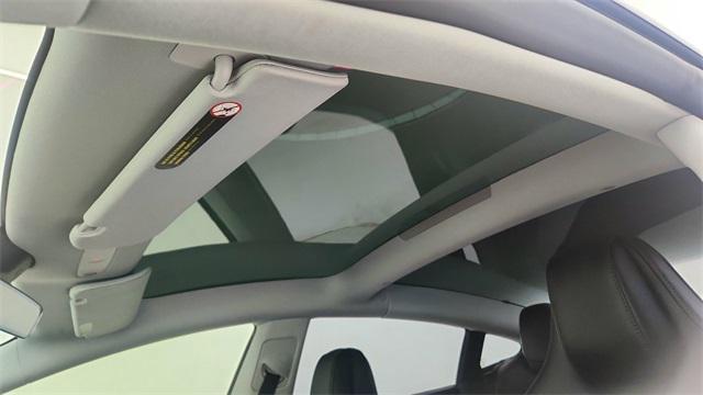Photo of 2025 Black Tesla Model 3