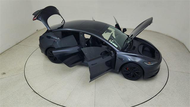 Photo of 2025 Black Tesla Model 3