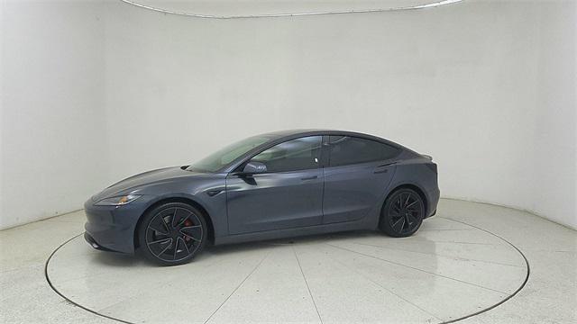 Photo of 2025 Black Tesla Model 3