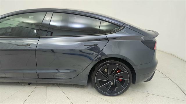 Photo of 2025 Black Tesla Model 3