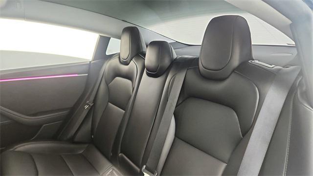 Photo of 2025 Black Tesla Model 3