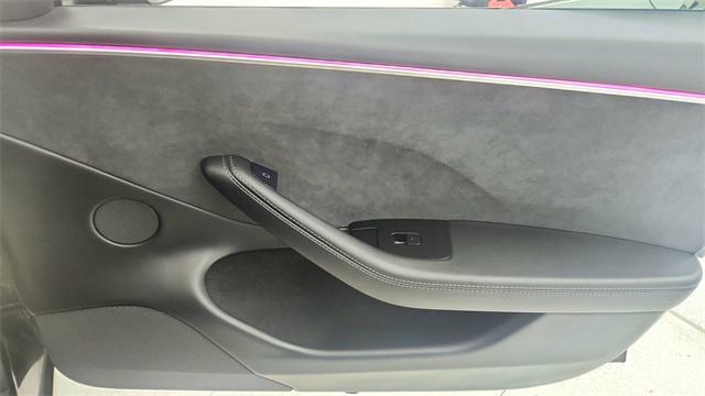 Photo of 2025 Black Tesla Model 3
