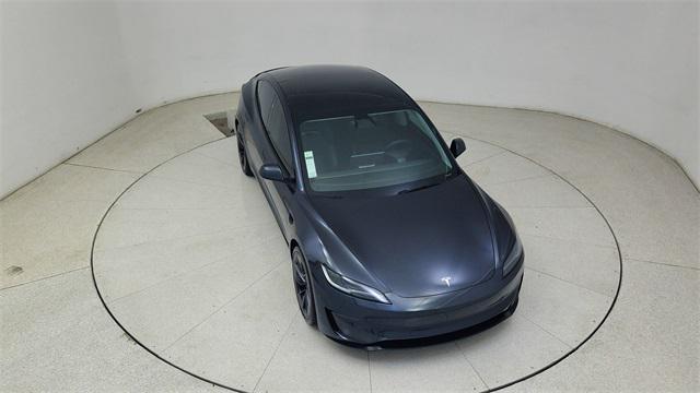 Photo of 2025 Black Tesla Model 3