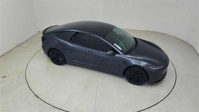 Photo of 2025 Black Tesla Model 3