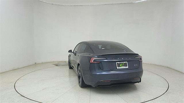 Photo of 2025 Black Tesla Model 3
