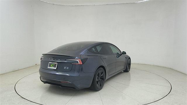 Photo of 2025 Black Tesla Model 3