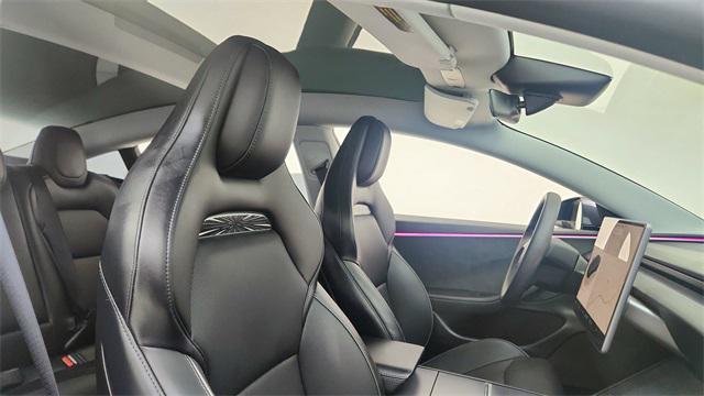 Photo of 2025 Black Tesla Model 3