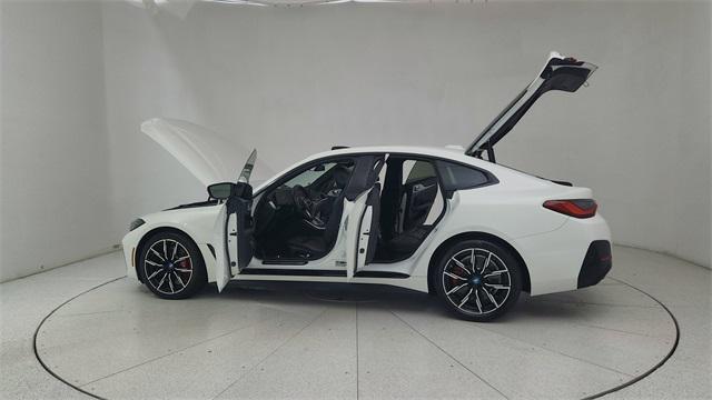 Photo of 2023 Alpine White BMW i4 Gran Coupe