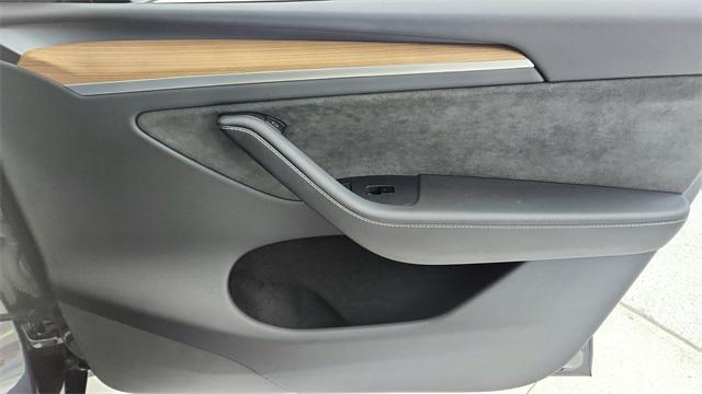 Photo of 2025 Stealth Grey Tesla Model Y