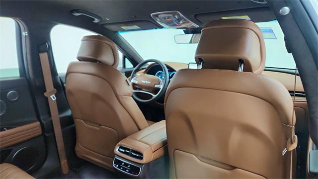 Photo of 2024 Alta White Genesis Electrified G80
