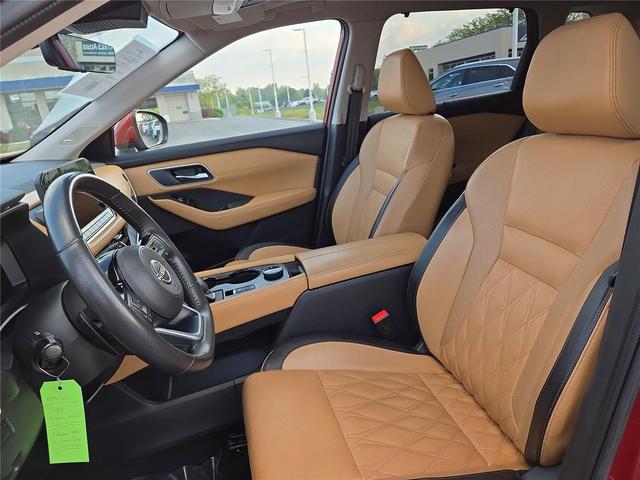 Photo of 2023 Scarlet Ember Tintcoat Nissan Rogue