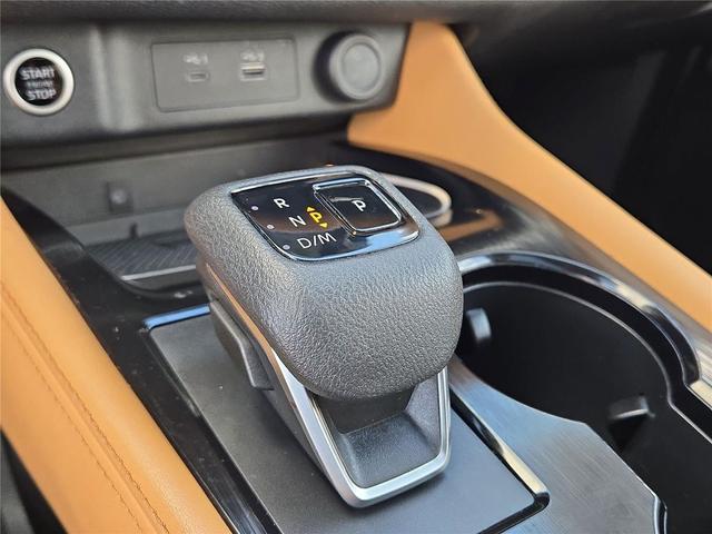 Photo of 2023 Scarlet Ember Tintcoat Nissan Rogue