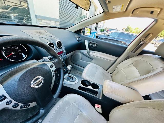Photo of 2008 Venom Red Pearl Nissan Rogue