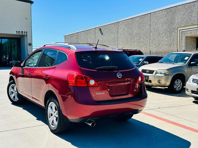 Photo of 2008 Venom Red Pearl Nissan Rogue