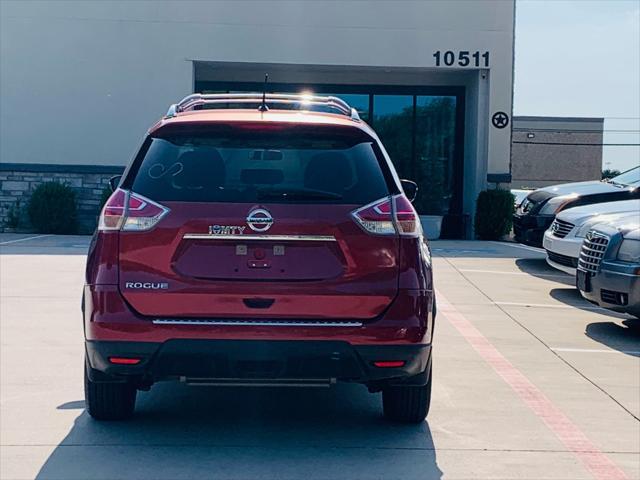 Photo of 2016 Cayenne Red Nissan Rogue