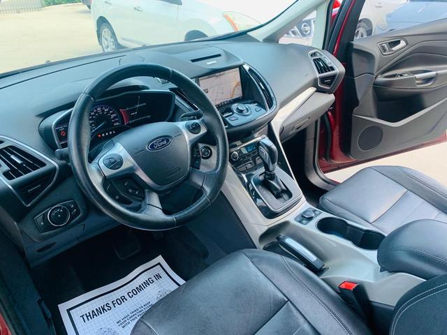 Photo of 2013 Ruby Red Metallic Tinted Clearcoat Ford C-Max Hybrid