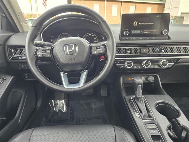 Photo of 2024 Meteorite Gray Metallic Honda Civic
