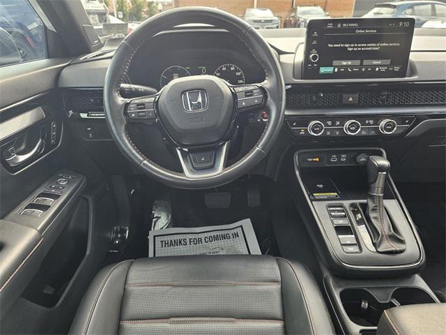 Photo of 2023 Platinum White Pearl Honda CR-V Hybrid