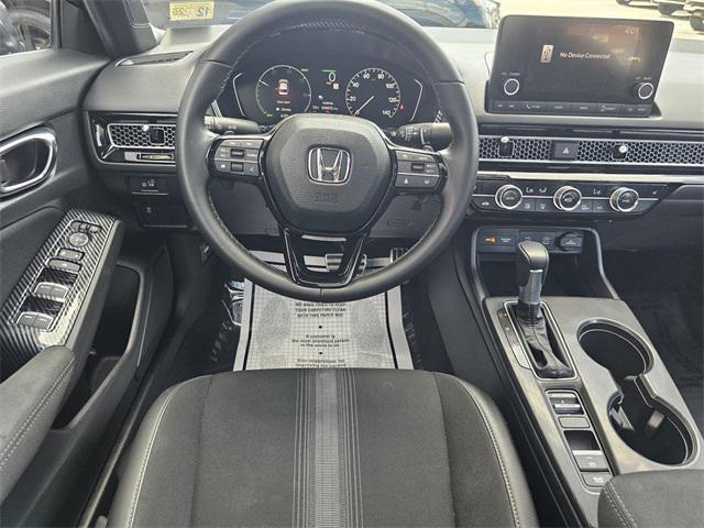 Photo of 2025 Crystal Black Pearl Honda Civic Hybrid