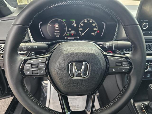 Photo of 2025 Crystal Black Pearl Honda Civic Hybrid