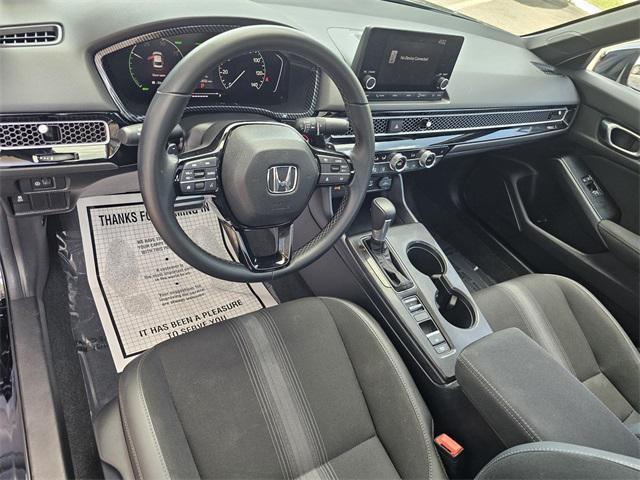 Photo of 2025 Crystal Black Pearl Honda Civic Hybrid