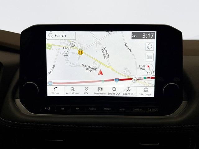 Photo of 2023 Pearl White Tricoat Nissan Rogue