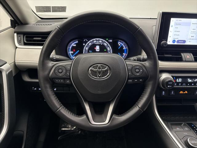 Photo of 2023 Midnight Black Metallic Toyota RAV4 Hybrid