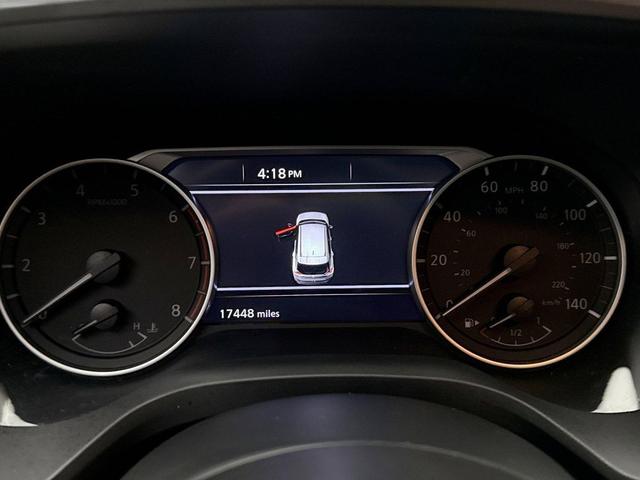 Photo of 2023 Pearl White Tricoat Nissan Rogue