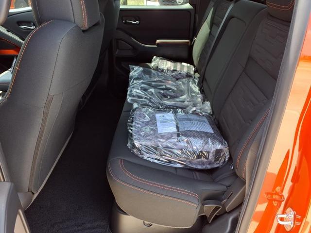 Photo of 2025 Afterburn Orange Nissan Frontier
