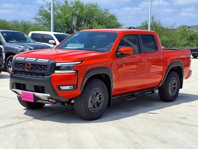 Photo of 2025 Afterburn Orange Nissan Frontier