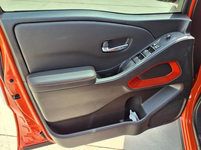 Photo of 2025 Afterburn Orange Nissan Frontier